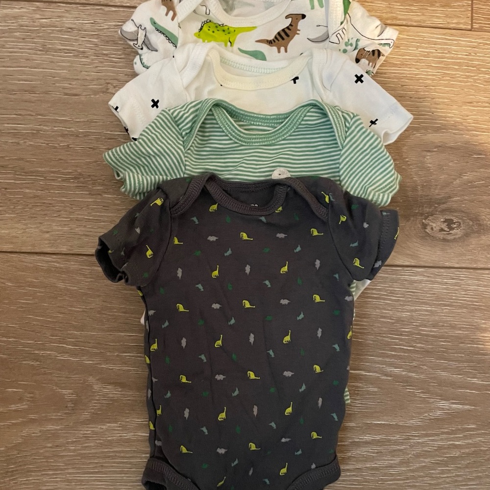 Baby boy onesie lightly worn NEWBORN set of 4